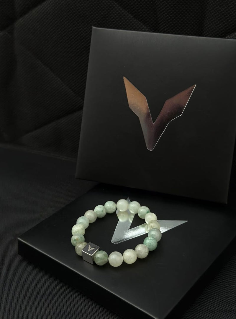 Bracelet with a logo on a black surface